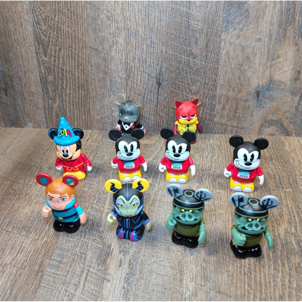 Disney Vinylmation Lot of 10 Figures Sleeping Beauty RunDisney Zootopia Wizard